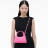 The Glam Claw Clip Crossbody Bag The Glam Claw Clip Crossbody Bag