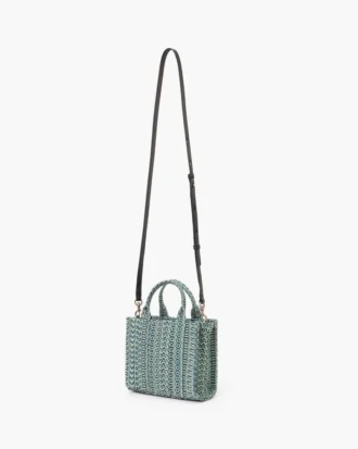 The Washed Monogram Denim Crossbody Tote Bag The Washed Monogram Denim Crossbody Tote Bag