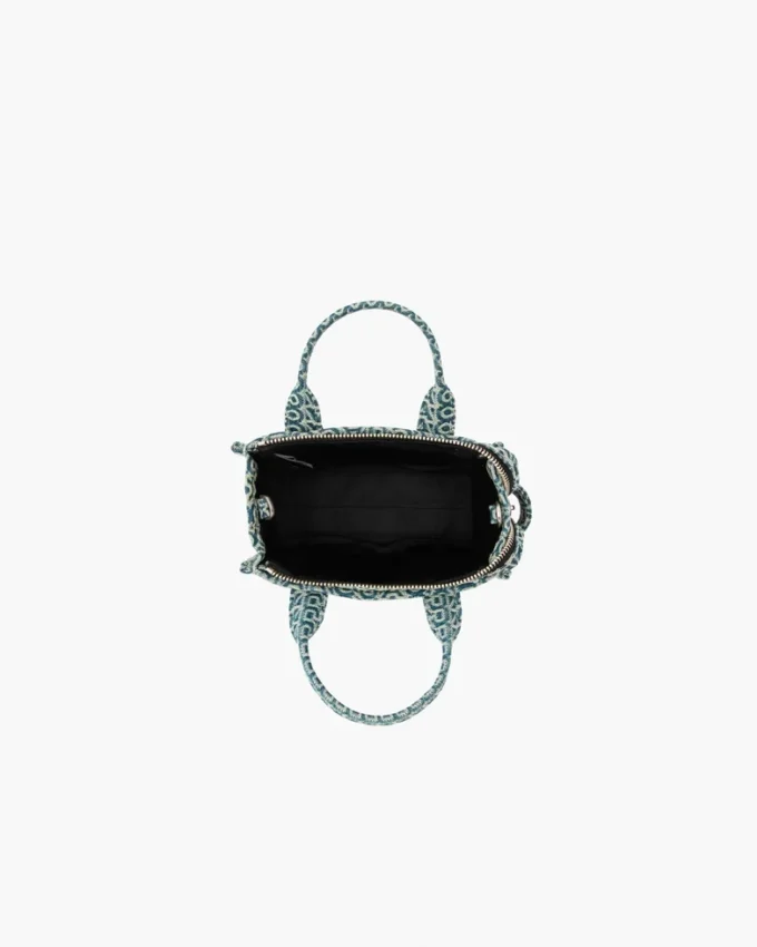 The Washed Monogram Denim Crossbody Tote Bag The Washed Monogram Denim Crossbody Tote Bag