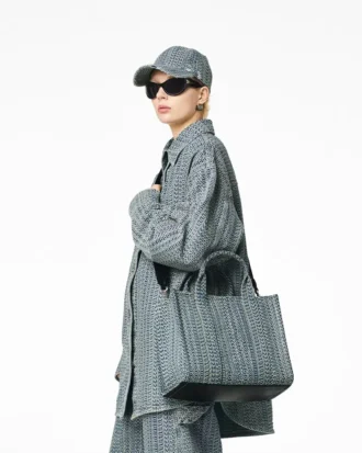 The Washed Monogram Denim Medium Tote Bag The Washed Monogram Denim Medium Tote Bag