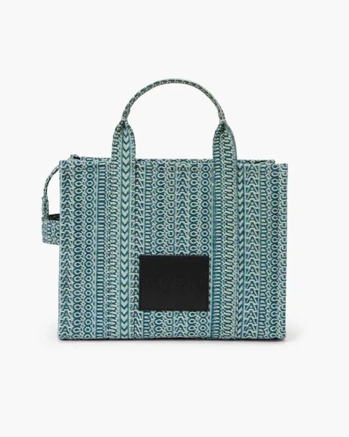 The Washed Monogram Denim Medium Tote Bag The Washed Monogram Denim Medium Tote Bag