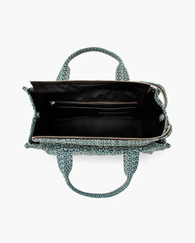 The Washed Monogram Denim Medium Tote Bag The Washed Monogram Denim Medium Tote Bag